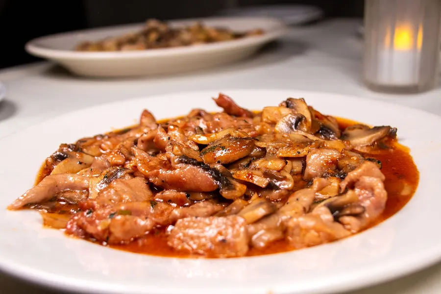 Veal with mushrooms in a savory sauce